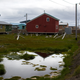Many homes in Utqiaġvik are built on platforms to prevent flooding due to permafrost thaw and subsidence. Photo: Ash Adams/Gizmodo